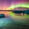 441 Aurora Reflections: A captivating and mesmerizing background featuring the reflections of the Northern Lights on calm waters