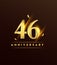 46th anniversary glowing logotype with confetti golden colored isolated on dark background, vector design for greeting card and