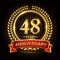 48th golden anniversary logo, with shiny ring and red ribbon, laurel wreath isolated on black background, vector design