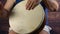 4k 50fps The hands of a percussionist play a hand drum creating rhythms