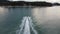 4K Aerial bird eyes view of jet ski boat cruising in high speed