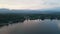 4K Aerial Drone Arc Orbit of Sunrise over Lake Placid with Mountains