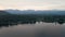 4K Aerial Drone Arc Orbit of Sunrise over Lake Placid with Mountains