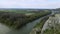 4K Aerial Drone Fly over Castle Ruins toward River and Fields