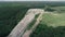 4K Aerial drone footage. Backward fly garbage dump
