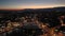 4K Aerial night view of waterfront skyline Geneva Switzerland