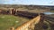 4K aerial Ruins of the old castle on a sunny day