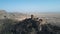 4K aerial video of ancient fortification is on the border of Georgia and Azerbaijan. Beautiful view of a sandy valley