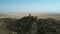 4K aerial video of ancient fortification is on the border of Georgia and Azerbaijan. Beautiful view of a sandy valley