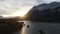 4k aerial video zooming out on sunrise scene over the Eibsee lake in Germany with the Zugspitze mountain framing the composition