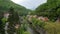 4K Aerial view of Baile Herculane - Thermal resort in Romania, gorgeous Austro-Hungarian Imperial Baths between the mountain