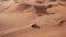 4K Aerial view following new e-tron in the desert of Abu dhabi. U.A.E. Electric car in desert