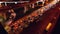 4K. Aerial view of highway road interchange with busy urban traffic speeding on the road at night. Junction network of