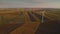 4K Aerial view over an eolian turbine wind farm. Green energy made from the wind