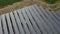 4K Aerial view of solar energy on the roofs of industrial plants by drone