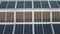 4K Aerial view of solar energy on the roofs of industrial plants by drone