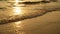 4K amazing sunset over the tropical beach. ocean beach waves on beach at sunset time , sunlight reflect on water surface.