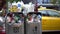 4K Asian woman walking and throw garbage in dustbin street at Taipei. Taiwan