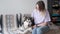 4k. attracive happy woman pet and scratch alaskan Malamute dog with love.
