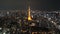 4k b-roll cinematic footage of night scene at Tokyo city with Tokyo Tower, aerial view. Panning left