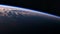 4K. Big Hurricane In The Rays Of The Rising Sun. Amazing View Of Planet Earth From Space.