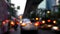 4K. blurry traffic jam on the road in the dusk at Bangkok city , Thailand