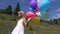 4K Child Waling with Balloons on Meadow, Happy Girl Playing Outdoor in Summer