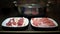 4K, Chinese hotpot soup. Plates of raw meat slides pork and duck at table