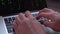 4k close-up hacker hands typing on a laptop,The Matrix style binary code on laptop,falling number,data digital display,f