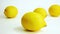 4k: A close up isolated slider view of group organic yellow lemons