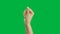 4K. close-up woman hand snap finger or clicks hand isolated on chroma key green screen