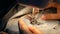 4K. close up of a woman sewing for repair blue denim jeans with a sewing machine