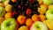 4K, close view of various fresh fruits, apple, apricot, cherry and hylas haqqÄ±nda