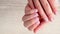 4k Closeup elegant pastel natural modern design manicure. Female hands. Gel nails. Nude manicure. Beige color. Skin care