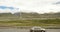 4k cloud rolling over Tibet barren mountaintop,highland railway,cattle & sheep.