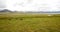 4k clouds mass rolling over Tibet mountain,River flowing the prairie