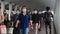 4K Crowded asian people wear face mask walking in pedestrian walkway
