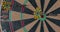 4K - Darts game. Close-up. Throwing darts at a dartboard.