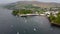 4k drone footage of the colourful houses of Portree Harbour on the Isle of Skye, Scottish Highlands