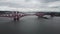 4k drone footage of the Forth Bridges crossing the Firth of Forth at Queensferry, Edinburgh