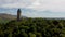 4k drone footage of the National Wallace Monument overlooking the city of Stirling in Scotland