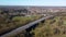 4k drone footage of traffic on a dual carriageway passing next to Stowmarket in Suffolk