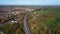 4k drone footage of traffic on a dual carriageway passing next to Stowmarket in Suffolk