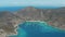 4k drone footage, wide-shot ascending, showing Island, Cove, and Sailboats Mooring in Jost Van Dyke