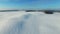 4K. Flight above snow fields in winter, aerial panoramic view Snow Desert