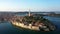 4K. Flight over beautiful Rovinj at sunrise. Morning aerial panorama of the old town of Rovinj in fantastic light, Istria, Croatia