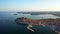 4K. Flight over beautiful Rovinj at sunrise. Morning aerial panoramic view of the old town of Rovinj.