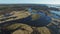 4K. Flight over flooded blue river in spring, aerial panoramic view