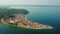 4K. Flight over old city Piran in the morning, aerial top panoramic view with old houses, Tartini Square, St. George`s Church.