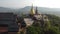 4K focus on Wat Somdet Phu Ruea Ming Mueang Temple from aerial view